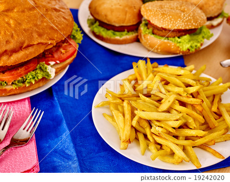 Hamburger and french fries. Hamburger and french fries. 19242020