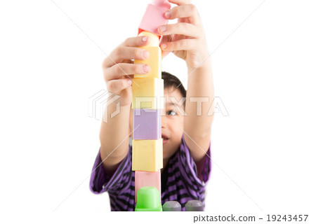 Little boy playing blocks at home 19243457