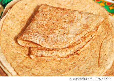 Stack of crepes on a plate 19248388