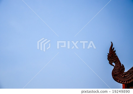 Naga statue in thai temple on blue sky background 19249890