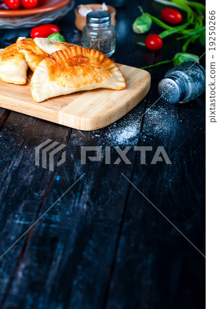 Fresh baked  pasties  19250266