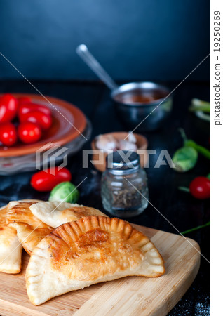 Fresh baked  pasties  19250269