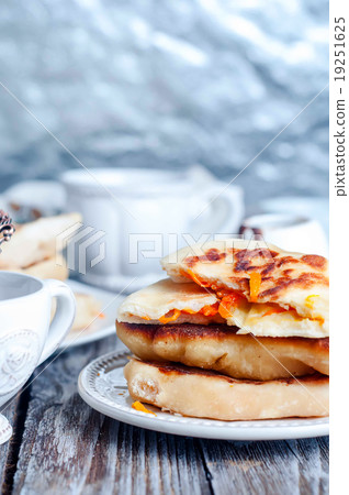 Whole pumpkin pie with tea Whole pumpkin pie with tea 19251625