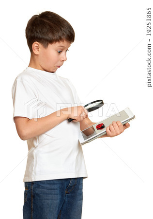 boy with computer tablet found a bug, information security concept boy with computer tablet found a bug, information security concept 19251865