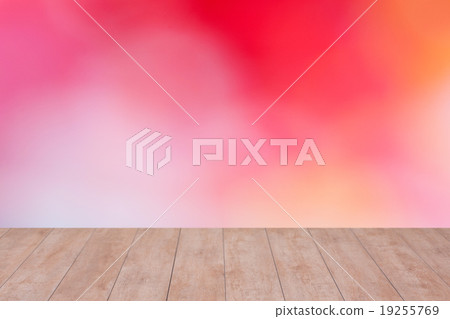 Wood table top on color abstract blurred 19255769