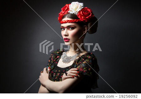 Beautiful girl with red lips and flowers 19256092