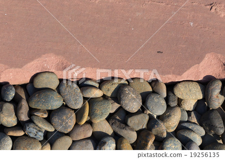 Pebble stones and sand stone background 19256135
