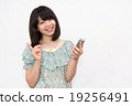 A woman with a smartphone A woman with a smartphone 19256491