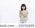 A woman with a smartphone A woman with a smartphone 19256499
