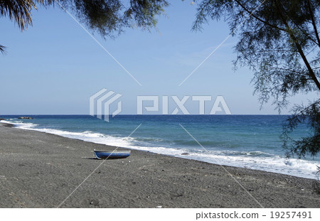 boat on volcanic beach on santorini siland boat on volcanic beach on santorini siland 19257491