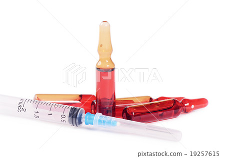 Ampoule with medicine isolated on a white  19257615