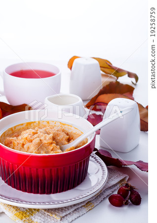 pumpkin porridge on a white background pumpkin porridge on a white background 19258759