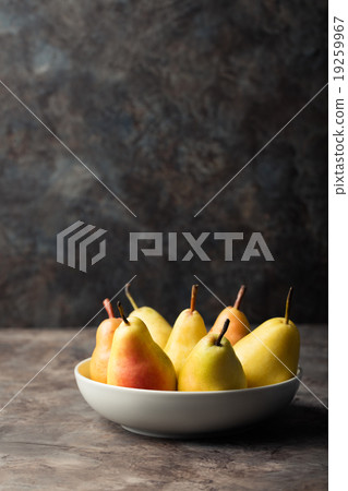Fresh Organic Pears in the plate Copy space 19259967