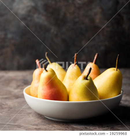 Fresh Organic Pears in the plate Copy space Fresh Organic Pears in the plate Copy space 19259968