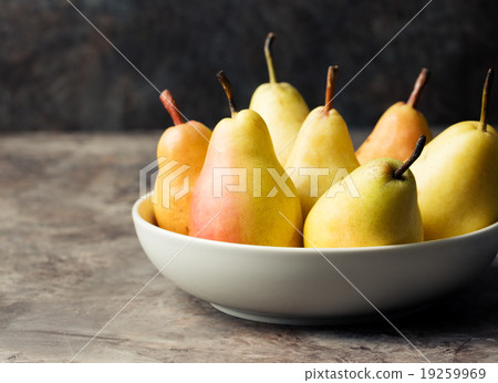 Fresh Organic Pears in the plate Copy space Fresh Organic Pears in the plate Copy space 19259969