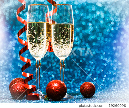 Two glasses of champagne with lights in the 19260098