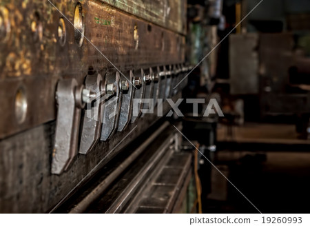 Vintage gloomy background of old mechanism Vintage gloomy background of old mechanism 19260993