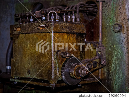 Vintage gloomy background of old mechanism Vintage gloomy background of old mechanism 19260994
