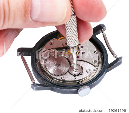 repairer repairs old watch isolated on white 19261296
