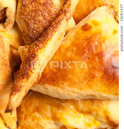 freshly baked italian cheese pies on the sacking 19261437