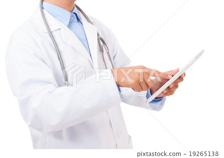 Doctor pointing on a digital tablet 19265138