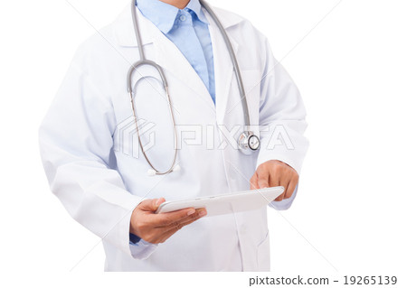 Doctor pointing on a digital tablet Doctor pointing on a digital tablet 19265139