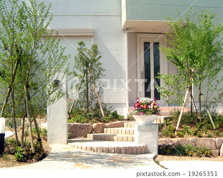 A beautiful container garden at the entrance and around the gate 19265351