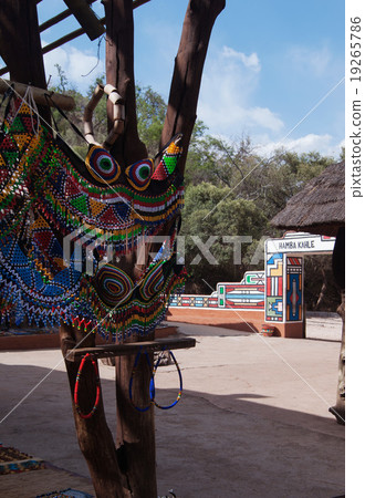 colored African ornaments made of beads and a colored African ornaments made of beads and a 19265786