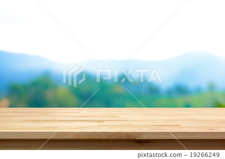 Wood table top on blur mountain background 19266249