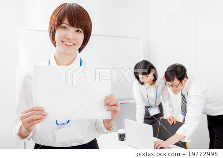 Business scene A man and a woman in a conference room 19272998
