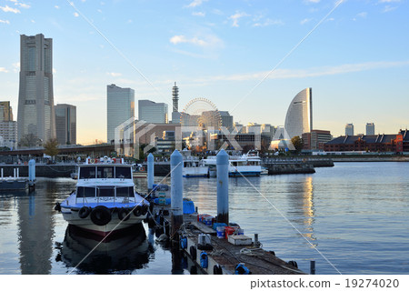 A white ship and a gleaming hotel in the western sun A white ship and a gleaming hotel in the western sun 19274020