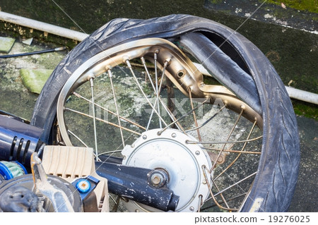 broken wheel of crashed motorcycle broken wheel of crashed motorcycle 19276025