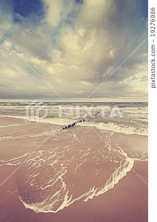 Vintage toned stormy sky over sea 19276986