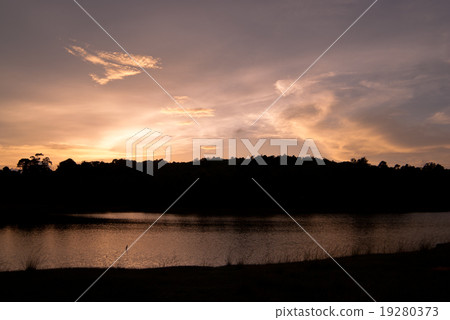 Beautiful sky landscape with sunset over river 19280373