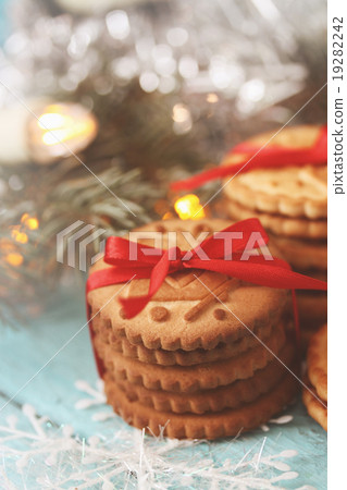 stack of cookies with a red bow, tinted 19282242