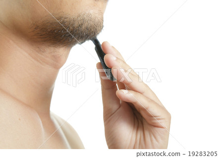 Close up of man shaving 19283205