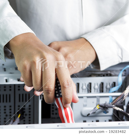 Technician repairing computer hardware 19283482