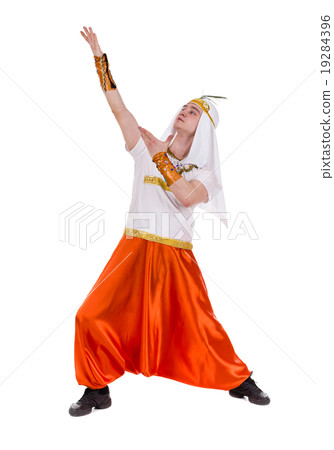 Pointing pharaoh wearing a egyptian costume Pointing pharaoh wearing a egyptian costume 19284396