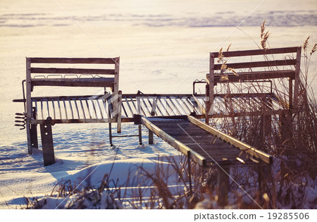 abandoned pier in winter at sunset abandoned pier in winter at sunset 19285506