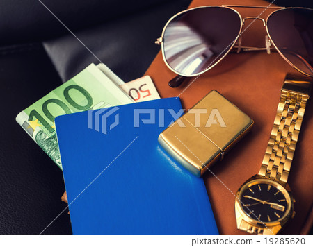 Traveler's accessory, passport, money, golden Traveler's accessory, passport, money, golden 19285620