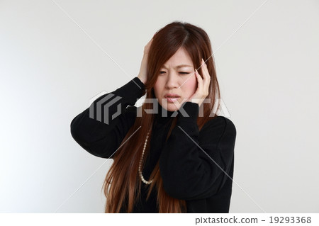 A woman holding a head A woman holding a head 19293368