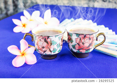 Double cup of tea in lovely flower pattern mini cups 19295525