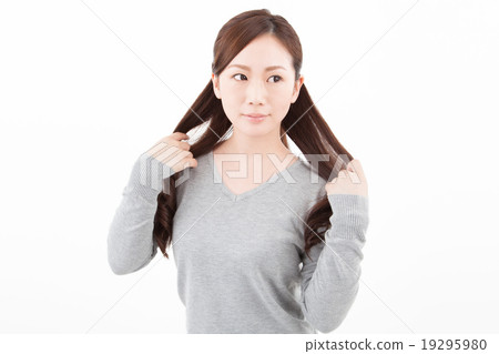 A woman with hair A woman with hair 19295980