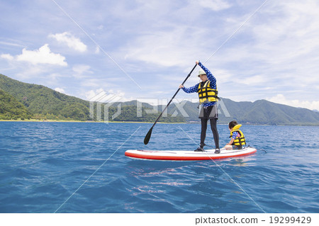 Parents playing marine sports 19299429