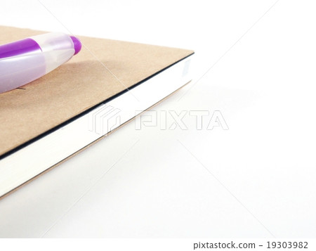 Blurry spine of notebook, pen, out of focus 19303982