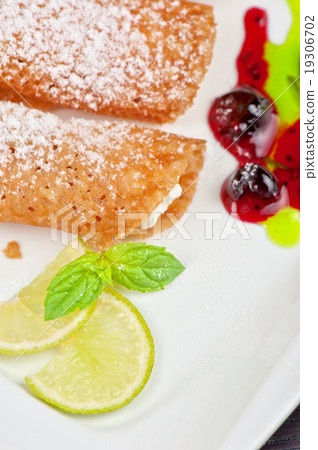 Sicilian cannoli at plate Sicilian cannoli at plate 19306702