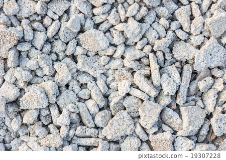 Chopped asphalt piled a bunch of different pieces 19307228