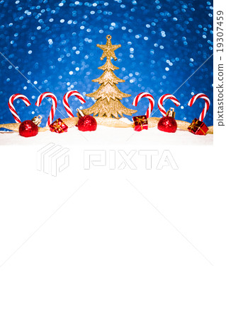 christmas ornament in snow on glitter background 19307459