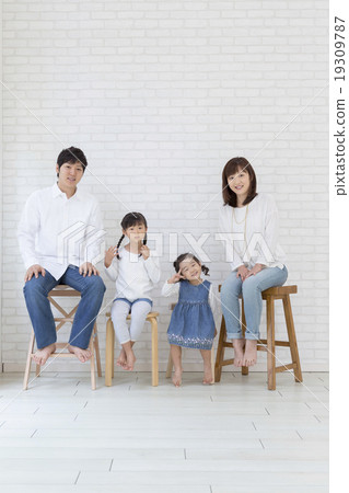 Japanese family sitting in a chair 19309787