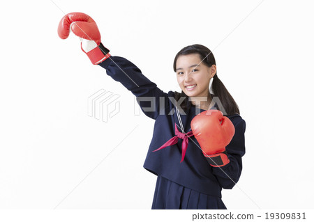 Junior high school girls wearing boxing gloves 19309831
